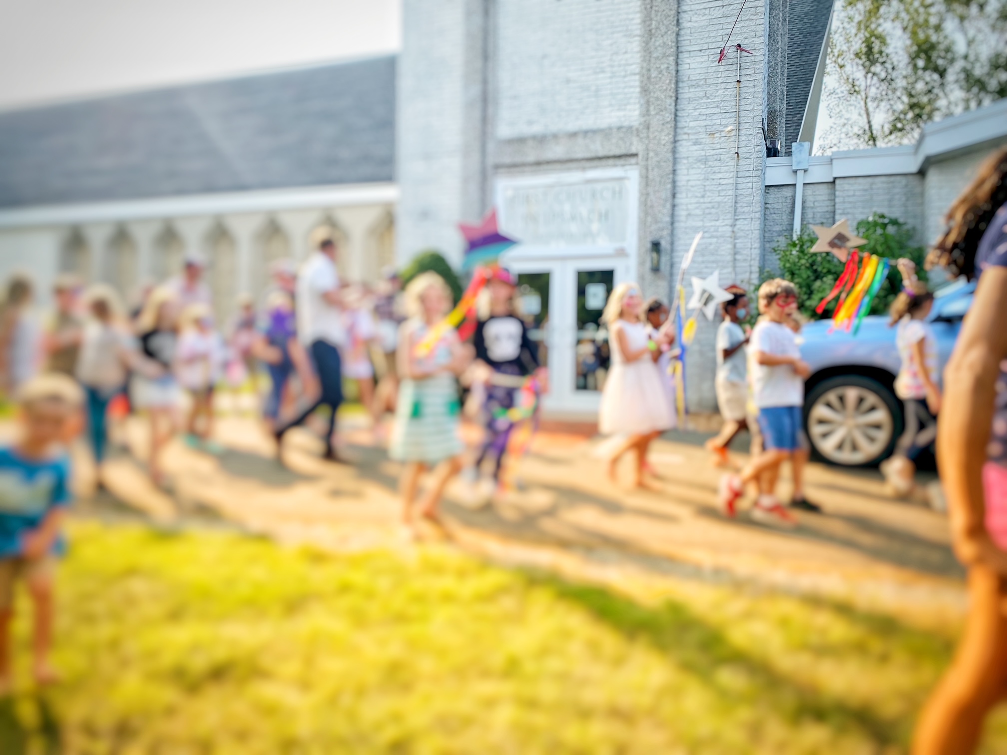Parade of kids outside the church